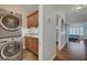 Convenient laundry room with modern appliances and cabinetry at 1432 Castle Crest Dr, Las Vegas, NV 89117