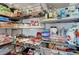 Well-stocked walk-in pantry featuring wire shelving, baskets, and a variety of food and household items at 1432 Castle Crest Dr, Las Vegas, NV 89117