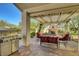 Outdoor patio with a built-in grill and fireplace, perfect for entertaining and relaxation at 1432 Castle Crest Dr, Las Vegas, NV 89117