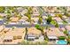 Aerial view of the neighborhood showcasing the neutral color schemes and desert landscaping at 1540 Singing Bird Ln, North Las Vegas, NV 89031