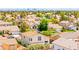 Aerial view of the home showcasing a landscaped yard in a well-maintained neighborhood at 1540 Singing Bird Ln, North Las Vegas, NV 89031