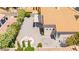 Aerial view showcasing backyard with gravel landscaping and a covered patio at 1540 Singing Bird Ln, North Las Vegas, NV 89031