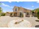 Spacious backyard with patio and decorative stone landscaping at 1540 Singing Bird Ln, North Las Vegas, NV 89031