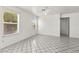 Bright bedroom with large windows and a ceiling fan at 1540 Singing Bird Ln, North Las Vegas, NV 89031
