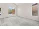 Spacious bedroom with vaulted ceilings, large windows offering plenty of natural light at 1540 Singing Bird Ln, North Las Vegas, NV 89031
