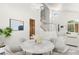 Elegant dining area with chandelier, table, and staircase at 1540 Singing Bird Ln, North Las Vegas, NV 89031