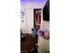 Bedroom closet with clothes, shelving, and storage container at 2131 Pillar Pointe St, Las Vegas, NV 89115