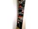 Closet featuring multiple shelves with organized clothes and baskets at 2131 Pillar Pointe St, Las Vegas, NV 89115