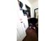 Bedroom closet showing clothing, mirror, and personal items at 2131 Pillar Pointe St, Las Vegas, NV 89115