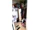 A walk-in closet features tile floors and an abundance of storage at 2131 Pillar Pointe St, Las Vegas, NV 89115