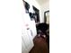 A bedroom closet features clothes and some personal items at 2131 Pillar Pointe St, Las Vegas, NV 89115