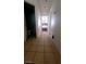 Bright hallway with tile flooring and view into the bedroom at 2131 Pillar Pointe St, Las Vegas, NV 89115