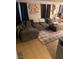 Comfortable living room featuring a large sectional sofa and an area rug at 2131 Pillar Pointe St, Las Vegas, NV 89115