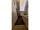 View of stairway with window, leading down carpeted stairs at 2131 Pillar Pointe St, Las Vegas, NV 89115