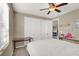Comfortable bedroom with closet, ceiling fan, and natural light, providing a cozy space for rest and relaxation at 232 Delighted Ave, North Las Vegas, NV 89031