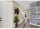 Inviting entryway with decorative wall accents and a glimpse of the staircase at 232 Delighted Ave, North Las Vegas, NV 89031