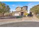 Attractive two-story home with a well-manicured front yard, a two-car garage, and inviting curb appeal at 232 Delighted Ave, North Las Vegas, NV 89031