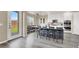 Bright kitchen with stainless steel appliances, a large island, and ample counter space at 232 Delighted Ave, North Las Vegas, NV 89031