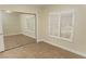 Neutral bedroom features tile floor, large mirror closet, and plantation shutters at 2501 Maddington Dr, Las Vegas, NV 89134