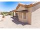 Back exterior of the home with desert landscaping at 2501 Maddington Dr, Las Vegas, NV 89134