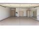 Spacious garage with storage cabinets and epoxy flooring at 2501 Maddington Dr, Las Vegas, NV 89134