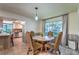 Charming dining area next to the open kitchen, perfect for casual meals and entertaining at 2531 La Cara Ave, Las Vegas, NV 89121