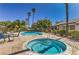 Inviting community hot tub with clear blue water and a nearby swimming pool, perfect for relaxation at 2531 La Cara Ave, Las Vegas, NV 89121