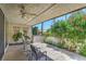 Outdoor patio space with plants and seating area with a ceiling fan at 2531 La Cara Ave, Las Vegas, NV 89121