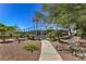 Well-maintained community tennis court surrounded by trees, offering a great recreational amenity at 2531 La Cara Ave, Las Vegas, NV 89121