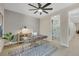 Home office with wood desk, rug, and access to the ensuite bathroom at 2621 Spalding Dr, Las Vegas, NV 89134