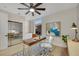 Home office showcasing modern desk, large window, and built-in cabinets at 2621 Spalding Dr, Las Vegas, NV 89134