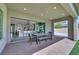 Open patio featuring an outdoor dining space and easy access to the kitchen at 3005 Merlesco Ave, Henderson, NV 89044