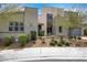 Modern home featuring a desert-style yard with low-maintenance landscaping and a two-car garage at 3005 Merlesco Ave, Henderson, NV 89044