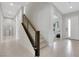 The bright hallway leads to the stairs and other rooms in the home at 3005 Merlesco Ave, Henderson, NV 89044