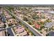 Wide aerial view of a suburban neighborhood with mature trees and well-maintained streets at 3396 Montessouri St, Las Vegas, NV 89117