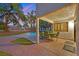 Inviting backyard with covered patio, outdoor dining table, stamped concrete, and lovely palm trees at 3396 Montessouri St, Las Vegas, NV 89117