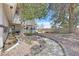 Backyard area features a stone pathway and rock landscaping for a peaceful outdoor retreat at 3396 Montessouri St, Las Vegas, NV 89117