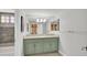 Bright bathroom with double sinks, and a shower-tub combo with decorative tile work at 3396 Montessouri St, Las Vegas, NV 89117