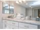 Contemporary bathroom boasts double sinks, marble countertops, and ample counter space at 3396 Montessouri St, Las Vegas, NV 89117