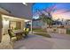 Enjoy outdoor dining on the covered patio with a built in BBQ and serene backyard at 3396 Montessouri St, Las Vegas, NV 89117