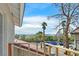View from an upper-level balcony showing desert landscaping, distant mountains, and blue skies at 3396 Montessouri St, Las Vegas, NV 89117