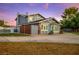 Charming two-story home with unique architectural details and a well-maintained front yard at 3531 W Arby Ave, Las Vegas, NV 89118