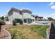 The backyard features a pool, grass, and privacy fence at 3604 N Campbell Rd, Las Vegas, NV 89129