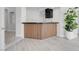 Stylish bar area boasts a wooden facade, black countertop, and nearby entryways at 3604 N Campbell Rd, Las Vegas, NV 89129