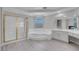 Luxurious bathroom featuring a corner tub, glass shower, and double vanity at 3604 N Campbell Rd, Las Vegas, NV 89129