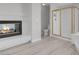 Bathroom featuring a fireplace and a glass enclosed shower with gold trim at 3604 N Campbell Rd, Las Vegas, NV 89129