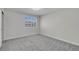 Bedroom with neutral carpet and a bright window at 3604 N Campbell Rd, Las Vegas, NV 89129
