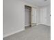 Bedroom with neutral carpet, closet, and a bright window at 3604 N Campbell Rd, Las Vegas, NV 89129
