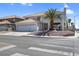 Charming two-story home featuring a two-car garage, desert landscaping, and a lovely second-floor balcony at 3604 N Campbell Rd, Las Vegas, NV 89129