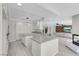 Modern kitchen featuring white cabinets, granite countertops, and stainless steel appliances at 3604 N Campbell Rd, Las Vegas, NV 89129